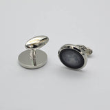 Wedding cufflinks with an antique moon theme and a long button closure
